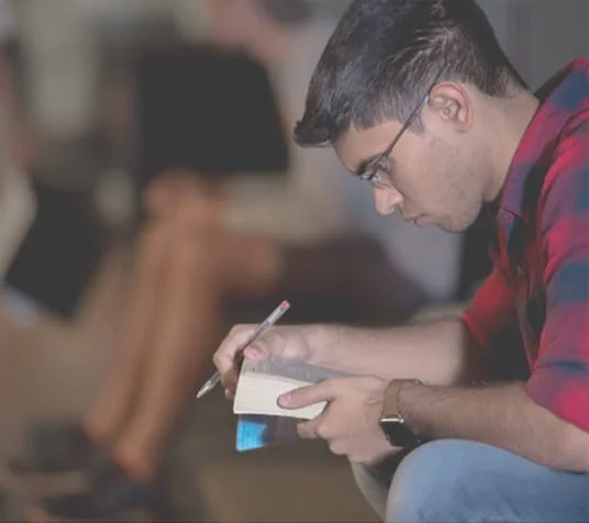 man studying bible