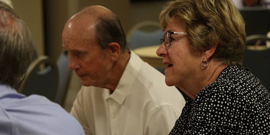 older adults sitting in class